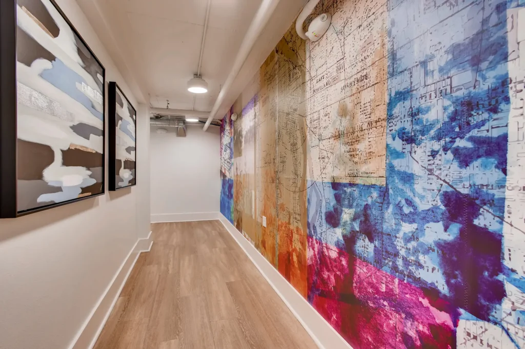 Building hallway with mural on the walls