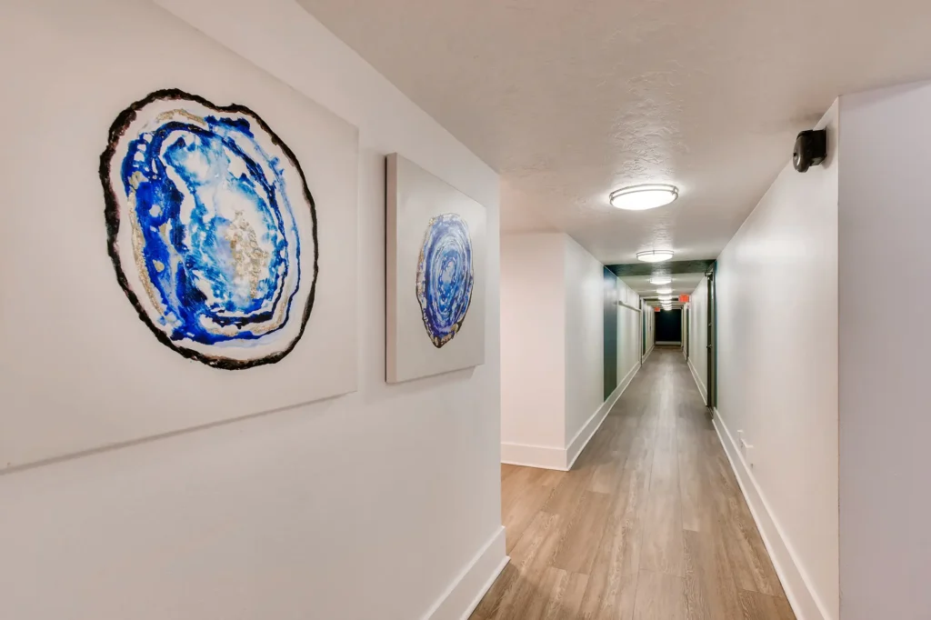 Building hallway with art hanging on the walls