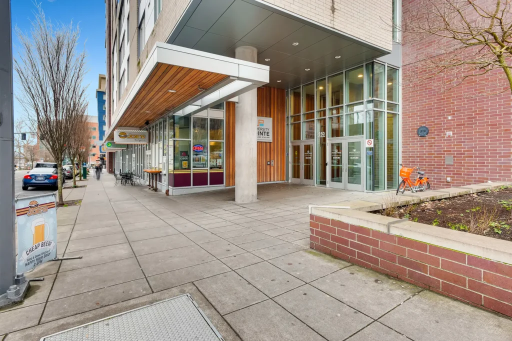 Joe's burgers restaurant with outside seating and a sign that says cheap beer