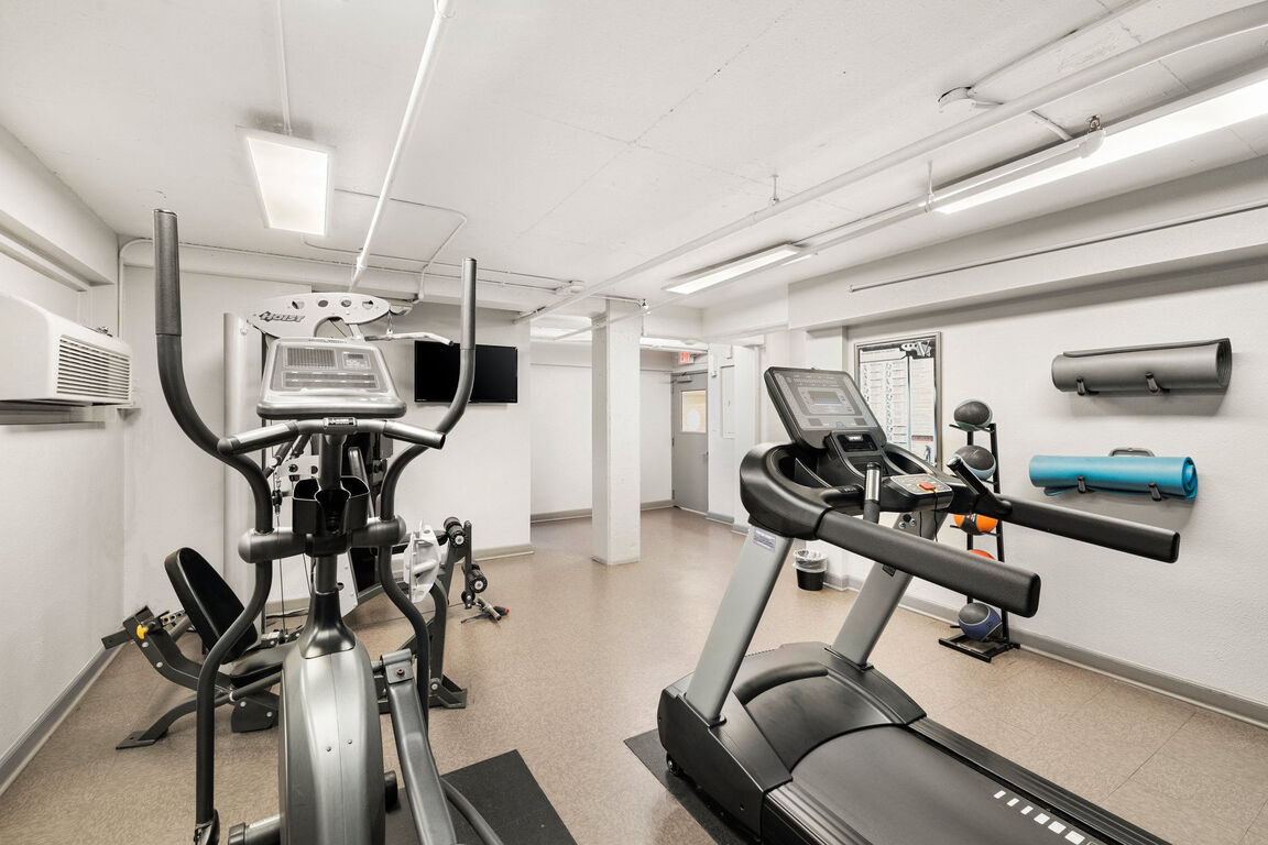 Fitness center with cardio machines and multi cable station