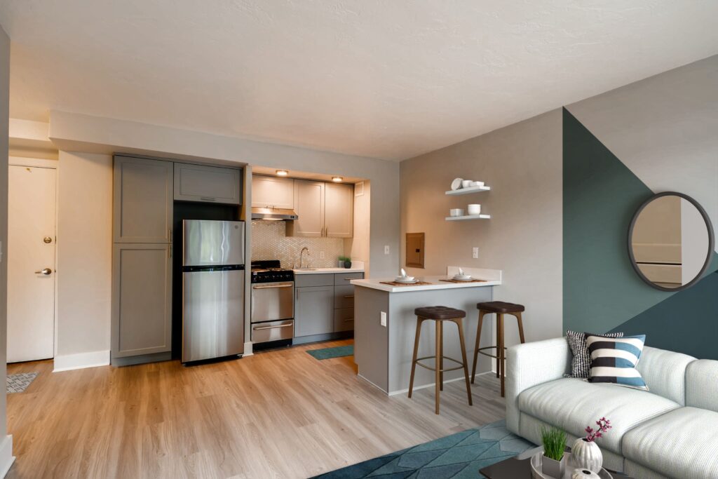 Living room with open view of kitchen