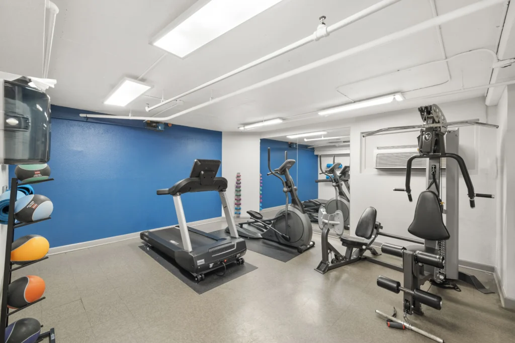 Fitness center with cardio machines and multi cable station