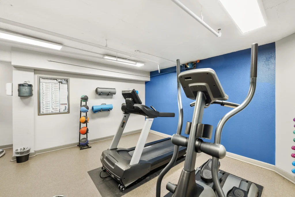 Fitness center with cardio machines and multi cable station