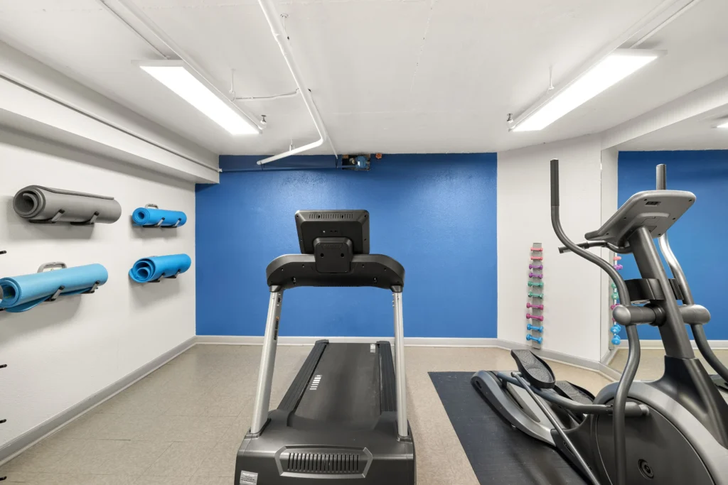Fitness center with cardio machines and multi cable station